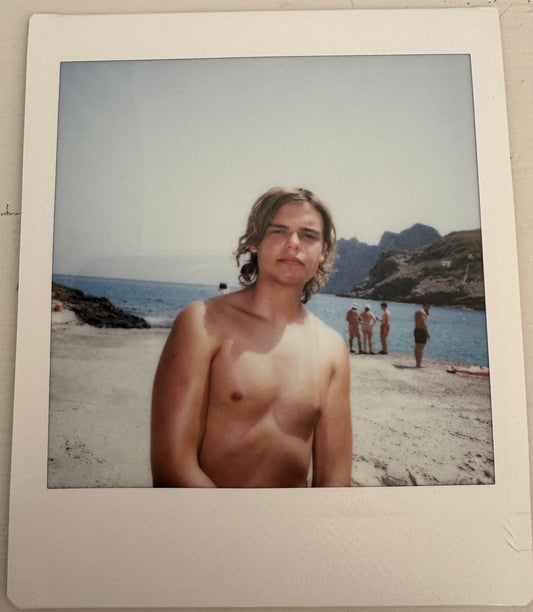 ONE UNIQUE SIGNED POLAROID PHOTO
