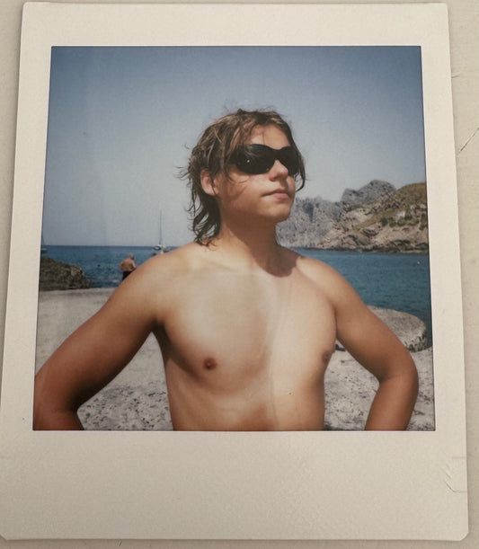 ONE UNIQUE SIGNED POLAROID PHOTO