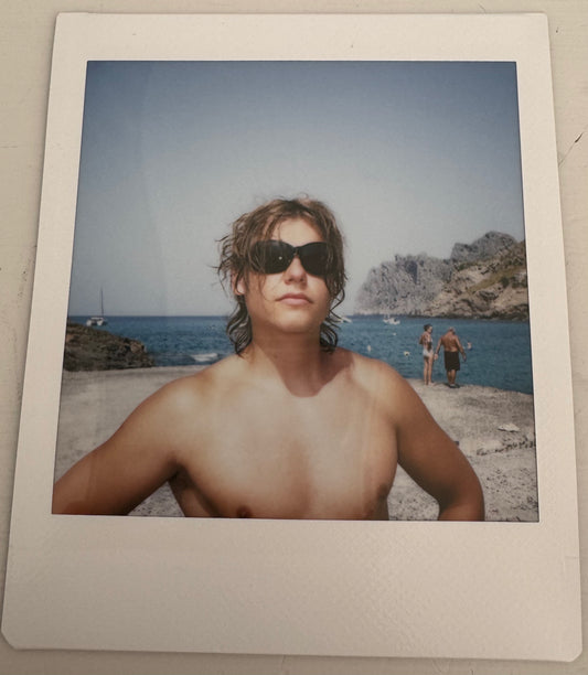 ONE UNIQUE SIGNED POLAROID PHOTO