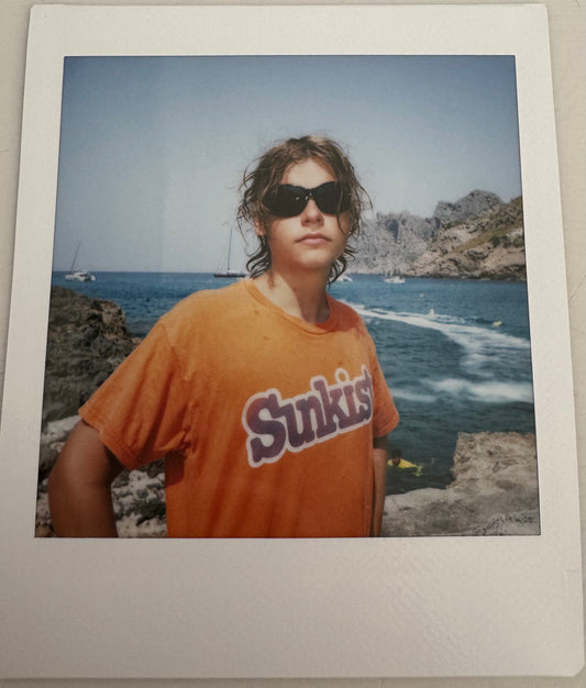 ONE UNIQUE SIGNED POLAROID PHOTO