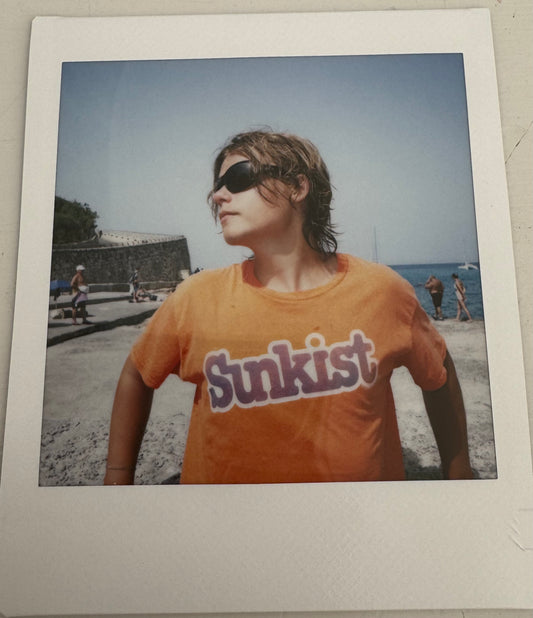 ONE UNIQUE SIGNED POLAROID PHOTO