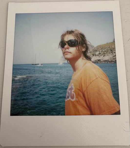 ONE UNIQUE SIGNED POLAROID PHOTO