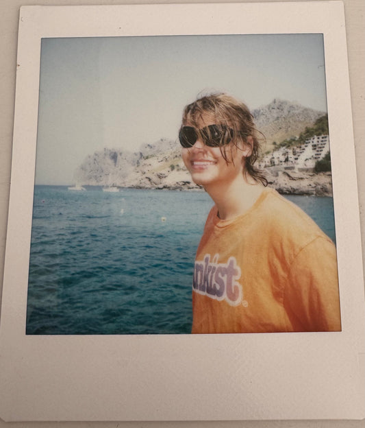 ONE UNIQUE SIGNED POLAROID PHOTO