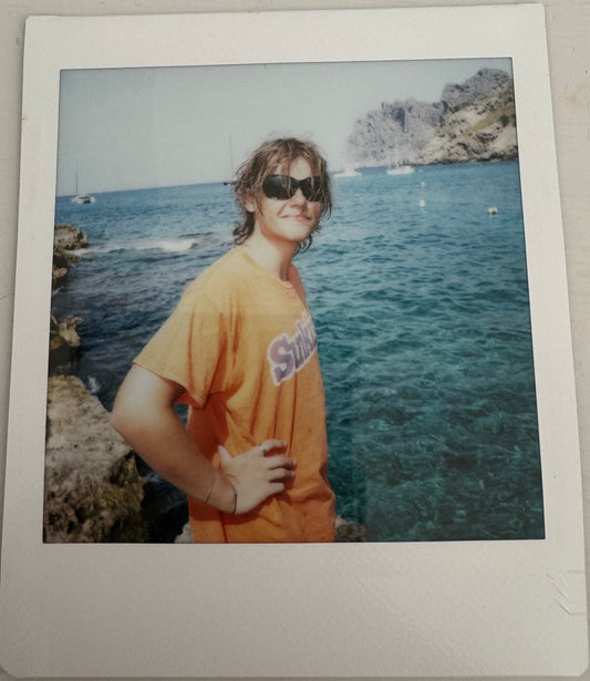 ONE UNIQUE SIGNED POLAROID PHOTO