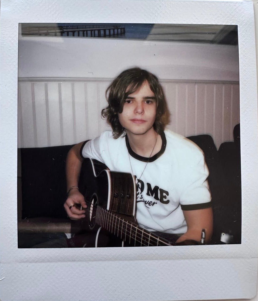 ONE UNIQUE SIGNED POLAROID PHOTO